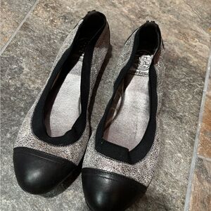 Tory Burch Black and Silver Flats Elegant Slip-On Design